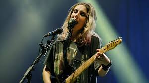 Purple & green, pushing themselves, working with producer. Wolf Alice S Ellie Rowsell Won T Take Mercury Prize Judging Too Seriously Bbc News