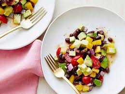 For the tomatoes, up to an hour before you're serving, combine the shallots, garlic, and vinegar in a medium bowl. Ina Garten S 25 Best Summer Dinner Recipes Food Network Canada