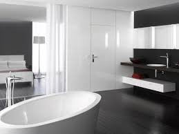 Effortlessly stylish, timeless and practical, a black and white bathroom scheme will play around with a range of textures, shapes and silhouettes in all of your decorating choices from tiles, to vanity, and even your freestanding bath. Designing A Bathroom In Black And White Ideas And Tips Hansgrohe Au