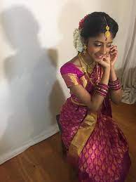 Plait With Jasmine Flowers Saree Ceremony Bridal Hair Purple Pink Kanchipuram Saree Gold Jewellery Saree Kanchipuram Saree Bridal Saree