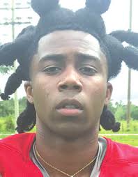 Murder suspect still