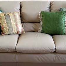 Microfiber couch with a plain white cloth, pressing the cloth down and lifting straight up rather than rubbing. How To Clean Your Microfiber Couch Dengarden