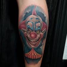 Black ink skull and clown tattoo design. Evil Clown Tattoos Meanings Tattoo Ideas More