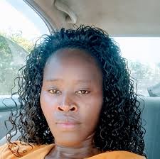 Finally I have met her and she's happy.... My sister Jane of Great hope  children's home Zimmerman you're best.... We are sharing Christmas with  this wonderful children's courtesy of Uwezo Tours And