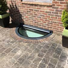 Window wells make it possible for you to bring more light, air, and life into your basement. Pin By Kathleen O Neill On Basement Lifestyle Daylight Systems Window Well Cover Window Well Light Well