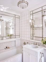 This stunning bath from designer mark williams is the stuff that dreams are made of. Small White And Gray Bathroom With Marble Clad Tub Transitional Bathroom