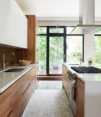 It brings clean lines and an open, modern look to your kitchen. 10 Walnut Kitchens With Warmth Style House Home