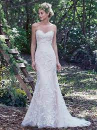 Trena Maggie Sottero Available At Stella S Bridal Evening Collections Fitted Wedding Dress Wedding Dresses Fit And Flare Wedding Dress