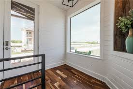 The warm interior finishes blend form and function for open plan living and entertaining. Ascensions On Lake Travis Austin Condo Information Lake Travis Condos Austin Condo Maps Condos Of Austin Texas