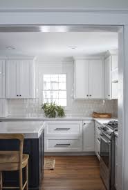 These black kitchen pulls stand out in the kitchen and gives contrast to the perfectly white cabinets. White Cabinets With Black Hardware Lovely Lucky Life