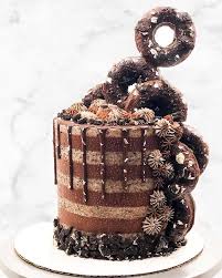 This creamy oreo poke cake recipe is one of our favorite easy and delicious cakes to throw together for any occasion. Sara Buffalo New York Op Instagram Happy National Doughnut Dontut Day What Better To Celebrate That An Oreo Chocolate Donut Cake For The Dou