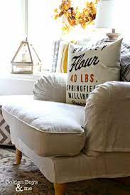 Farmhouse chairs celebrate the rustic charm of farmhouse living by emphasizing wood craftsmanship, distressed finishes and fresh, light neutrals. Kivik Room Arrangement