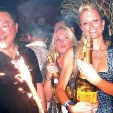 Jho low, paris hilton and always a lot of champagne around (grosbygroup). Jho Low And Paris Hilton Partying In St Tropez Paris Hilton Partying Celebrities Paris Hilton