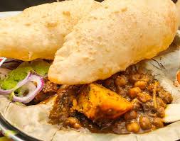 You don't just eat it; Best Places To Eat Chhole Bhature In Gurgaon We Are Gurgaon