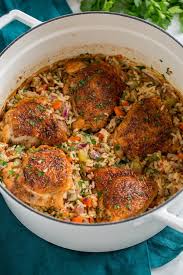 One Pot Chicken And Rice A Flavorful Recipe Including Tender Pan Seared Chicken Thighs And Seasoned Chicken Dinner Recipes Flavorful Recipes Chicken Recipes
