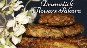 They used to make bread pakora for me, mirchi vada for my granny, mix veg pakora for my sister, bread roll for my brother and onion pakora for my dad. Drumstick Flowers Pakora Thegreatindiantaste Com Youtube