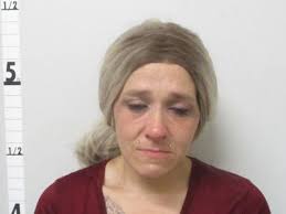 A woman from Thayer is being held in Thayer jail