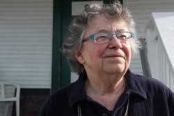 1964 earthquake devastated villages, Davis captured survivor stories