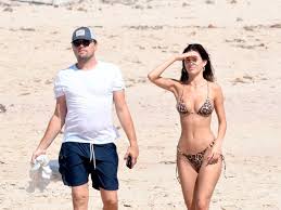 Leonardo dicaprio and camila morrone have been dating since december 2017. Leonardo Dicaprio Strolls Along Sand With Camila Morrone As Couple Set To Wed Mirror Online