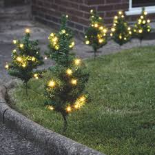Plastic universal rolling tree stand your christmas tree's safety is important, your christmas tree's safety is important, and so is your piece of mind; Outdoor Christmas Tree Path Lights Will Create Welcoming Entrance For Guests