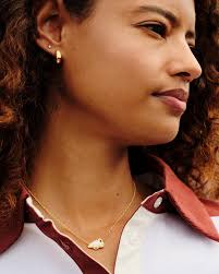 Kendra Scott cheer necklaces are going SO FAST!💨📣 We carry it in gold and  silver- don't miss out before they're all gone!💫