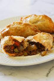 Delicious Beef Pasties Made With Savoury Mince And Light Golden Puff Pastry Are A Dinner The Whole Pasties Recipes Cooking Recipes Puff Pastry Recipes Dinner