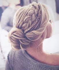 The Most Perfect Braided Updo Twisted Into An Elegant Low Bun This Hairstyle Is Abso Braided Hairstyles For Wedding Bridal Hair Updo Trendy Wedding Hairstyles
