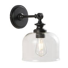 Crafted of metal in a mission dusk bronze finish, this fixture features a round backplate with molded details and. Scn4065a Set2 Sconces Lighting By Safavieh