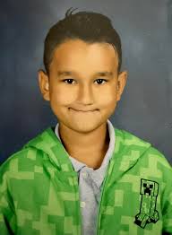 3 school kids with shaggy hair one red shirt one black shirt cant remember  what the other was wearing hoing up 12th ave se treatening with a machette  there from a school