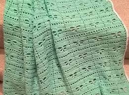 I learned how to make the elephant border by watching the happy hooker's great tutorial on youtube. No Longer Available Gorgeous Traditional Baby Blanket Featuring Dragonflies Knit And Crochet Daily