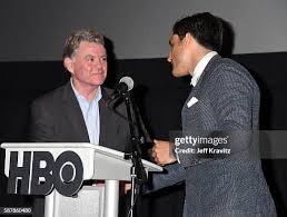 Senior VP of the Boys & Girls Club Kevin McCartney presents HBO... News  Photo