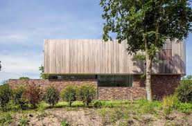 This level features a large front porch with massive stone based columns supporting the open timber framed roof. Cloud 9 Contemporary Villa Is Covered In Timber And Stone And The Glass Walls Allow To Create A Bright Interior Design Caandesign Architecture And Home Design Blog
