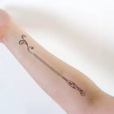 Tattoo Uploaded By Tattoodo Cast A Spell With These Harry Potter Wand Tattoos Harrypotter Magic Wands Harrypotterw Wand Tattoo Tattoos Ankle Tattoo Small