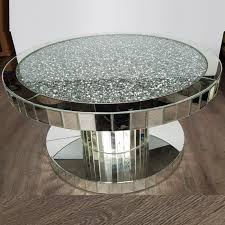 Mirrored coffee tables add much more than glamour to your living room and bring functional value in small living rooms. Mirrored Coffee Table Round
