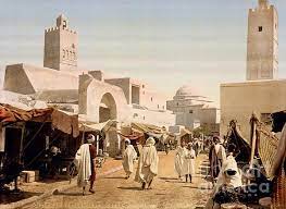 main street and mosque by celestial images tunisia mosque street scenes