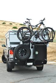 Aluminess Swing Away Bike Rack Swing Arm On A Toyota Tundra With Aluminess Rear Bumper Pop Up Truck Campers Truck Camper Slide In Truck Campers