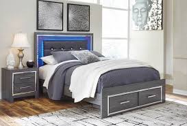 Johurst grayish brown king panel bed with storage footboard. Lodanna Gray Queen Panel Bed With Footboard Storage Speedyfurniture Com