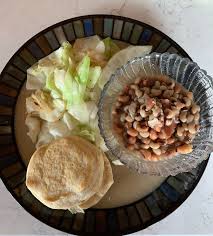 Butter peas this is how we do it. Southern New Years Day Meal Black Eyed Peas With Ham Hock For Luck Butter Sauteed Cabbage For Money Flaky Biscuits For The Pea Gravy Foodporn