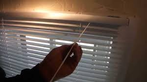 Attach the brackets using a drill, place the head rail into the brackets, attach the valence to the head rail, and secure the blind wand to complete the process. Installing Mini Blinds With Greg Zanis Youtube