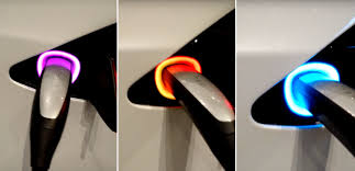 Some people are just really dedicated to not losing their car keys. Tesla S Latest Software Update Easter Egg Is A Rainbow Charge Port Industry Tap