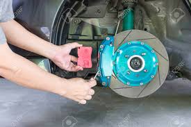 Drum brakes are used only on the rear of some vehicles. A Man Adjust Bolt For Unlock Brake Pads To Change In Basic Service Concept Of Car With Run Stop System Stock Photo Picture And Royalty Free Image Image 137974807