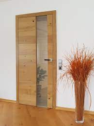 Mit einer wandbündigen tür können sie die bedeutung der tür als ort des übergangs verschieben. Pin Auf Innenturen Holz