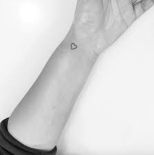 A clever design that spans both wrists 26. 46 Tiny Tattoo Ideas Even The Most Needle Shy Can T Resist Tiny Tattoos For Women Tiny Wrist Tattoos Tiny Tattoos For Girls