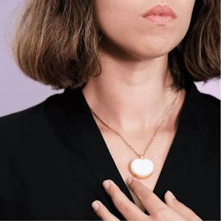 Bond Heart haptic necklace in action., AI generated