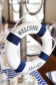 Set up a photo booth that looks like a ship's helm, complete with sailor hats and other nautical photo props. Kara S Party Ideas Nautical Themed Baby Shower Kara S Party Ideas