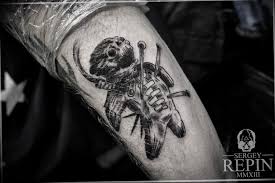 Mid city voodoux tattoos, new orleans, la. Voodoo Doll Tattoo Meaning History Of The Picture Photo Examples Sketches