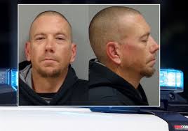 Police arrest suspect in Adrian machete attack