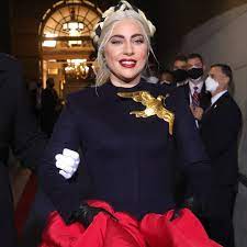 After debuting the look, lady gaga tweeted a photo of the pin and wrote, a dove carrying an olive branch. Lady Gaga S Inauguration Brooch Sparks Hunger Games Comparisons E Online