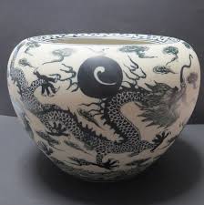 This is a chinese handcrafted ceramic teapot with an elephant shape and a celadon glaze, which we date to the 20th century, circa 1930s. Art Collectibles Fine Art Ceramics Dragon Pot