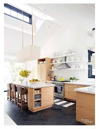 Navy blue hues repeat on this shower's floor tile and shelving backsplash. Red Maple S Better Homes And Garden House Red Maple Workshop Architects Designers